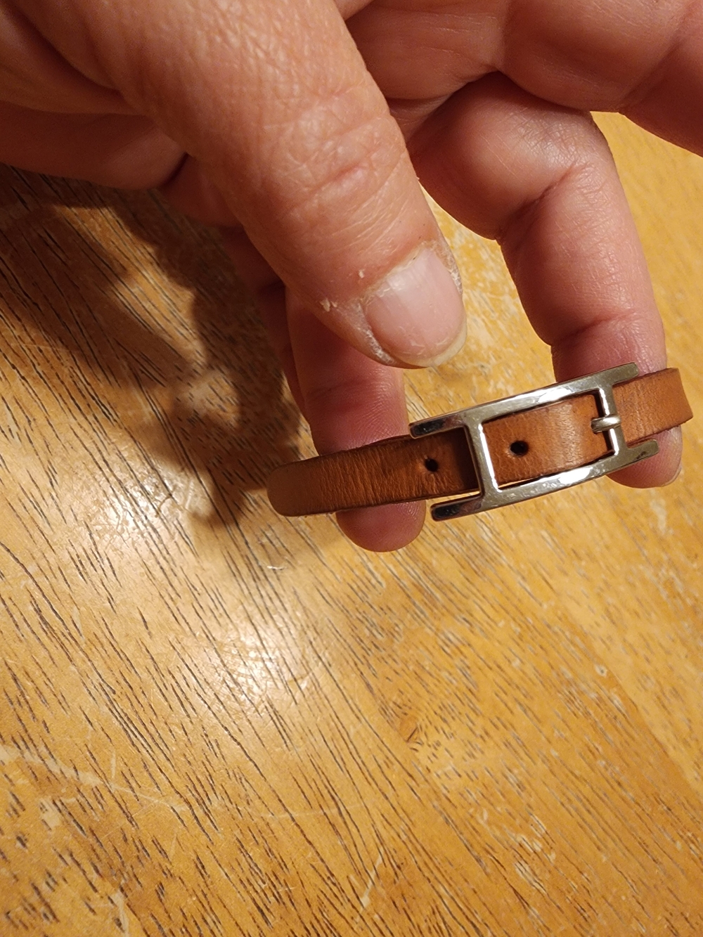 Hermès Hapi bracelet featuring a palladium-plated buckle